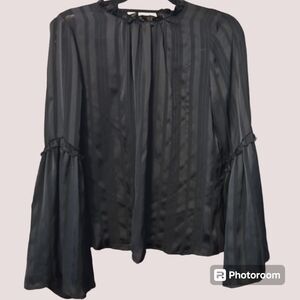 Sheer black with bell sleeves blouse. Made by lush, size small. Shoulder to sh